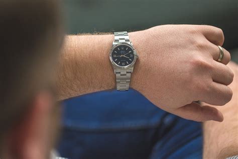 34mm watch on man's wrist.